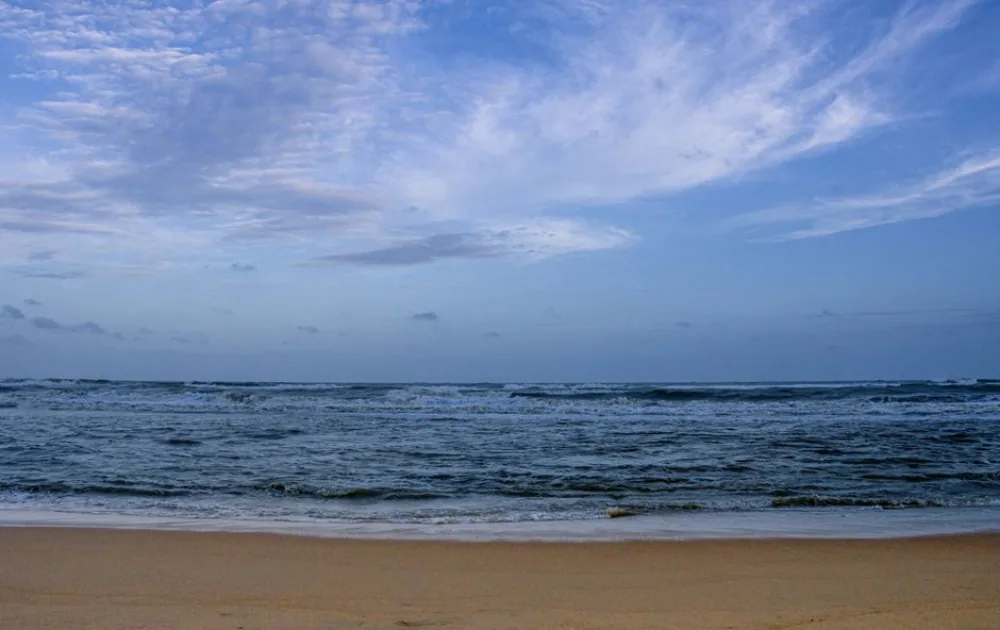 Waves of the Bay of Bengal rolling onto Puri Beach at dawn, Odisha